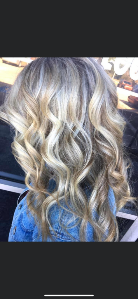 curls and highlights done at Sassy Layers Hair Salon in Friendswood